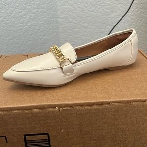 Beige Tilocow flats. New, never worn. Run small